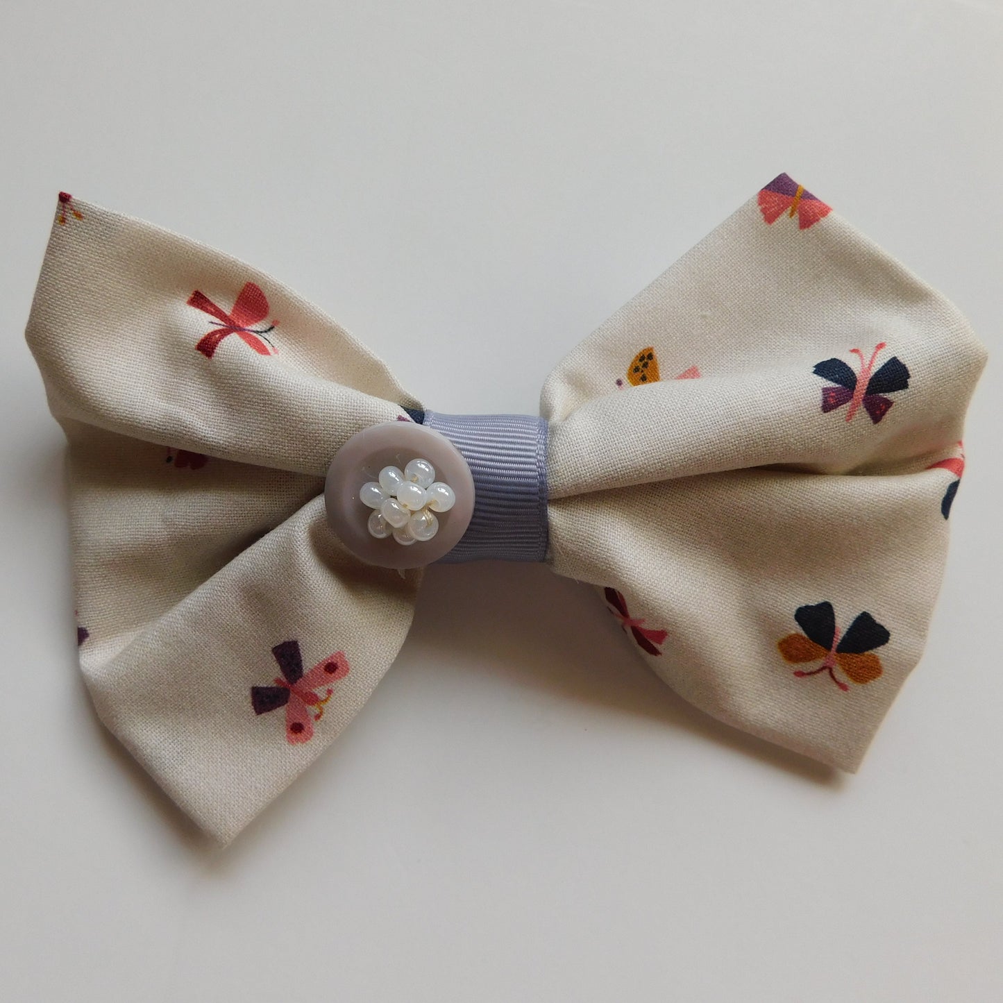 Purple Button Bow