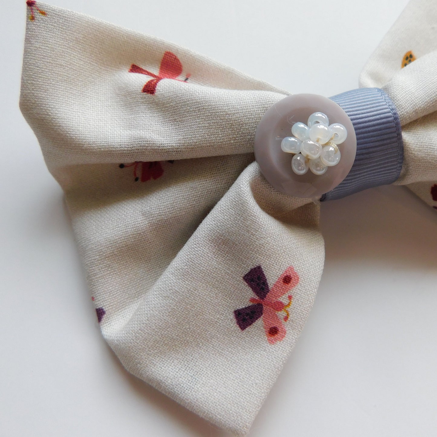 Purple Button Bow
